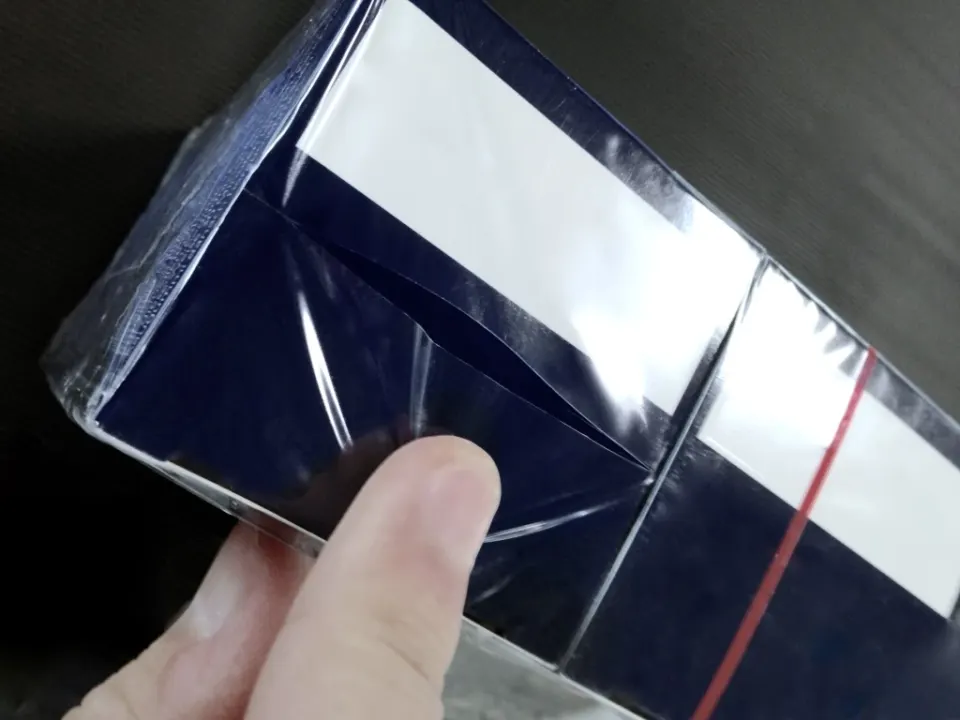 Plastic film being selectively cut by a focused laser beam.